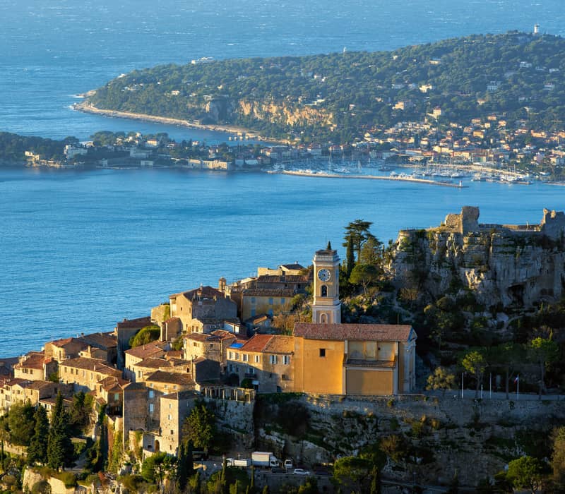 Charming hilltop village overlooking the Mediterranean, featuring historic stone architecture and breathtaking coastal views.