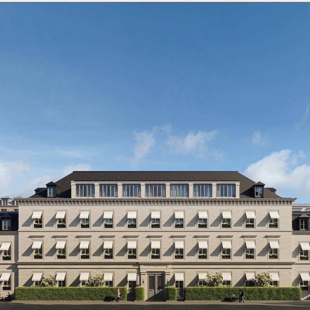 Elegant stone hotel facade with striped awnings and manicured greenery, viewed from the street under a clear blue sky.