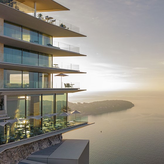 The sweeping views of the riviera seas from the balcony of the sleek designed Maybourne Riviera