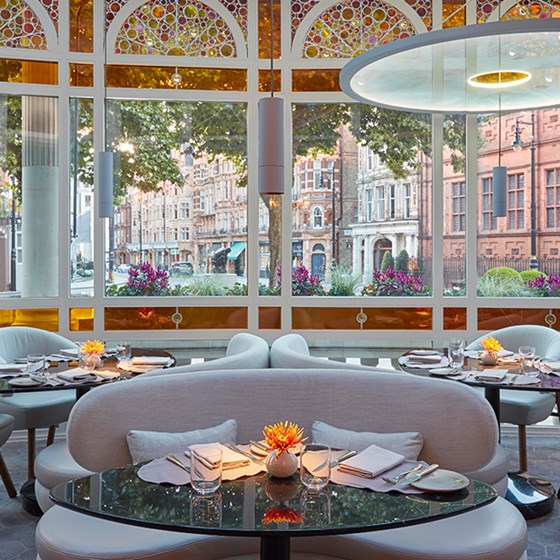 Jean-Georges at The Connaught - view of the room with the glass windows and view on the street in the background.